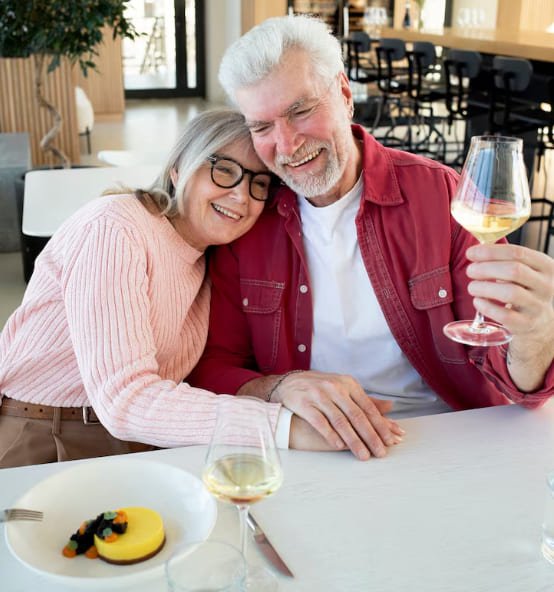 Mature couple enjoying a restaurant dinner together
