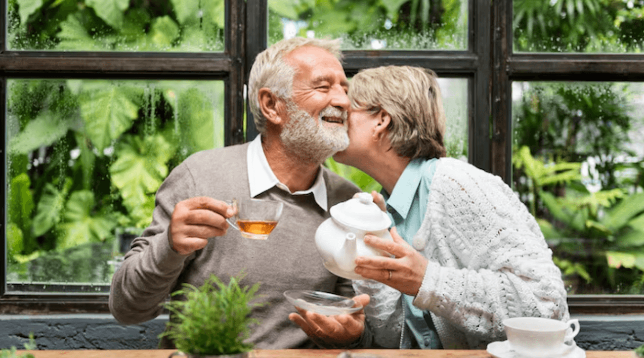 Mature couple sharing tea together