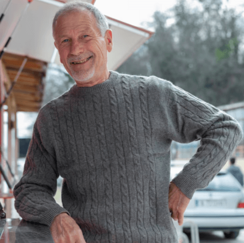 Mature man enjoying an outdoor café setting