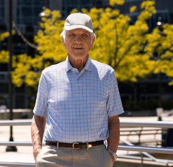 Mature man enjoying a sunny afternoon in a city park