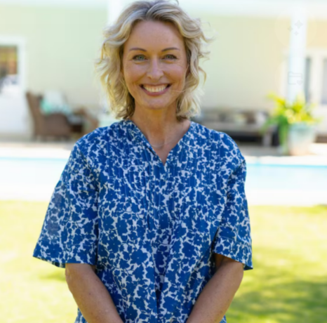 Mature woman smiling outdoors